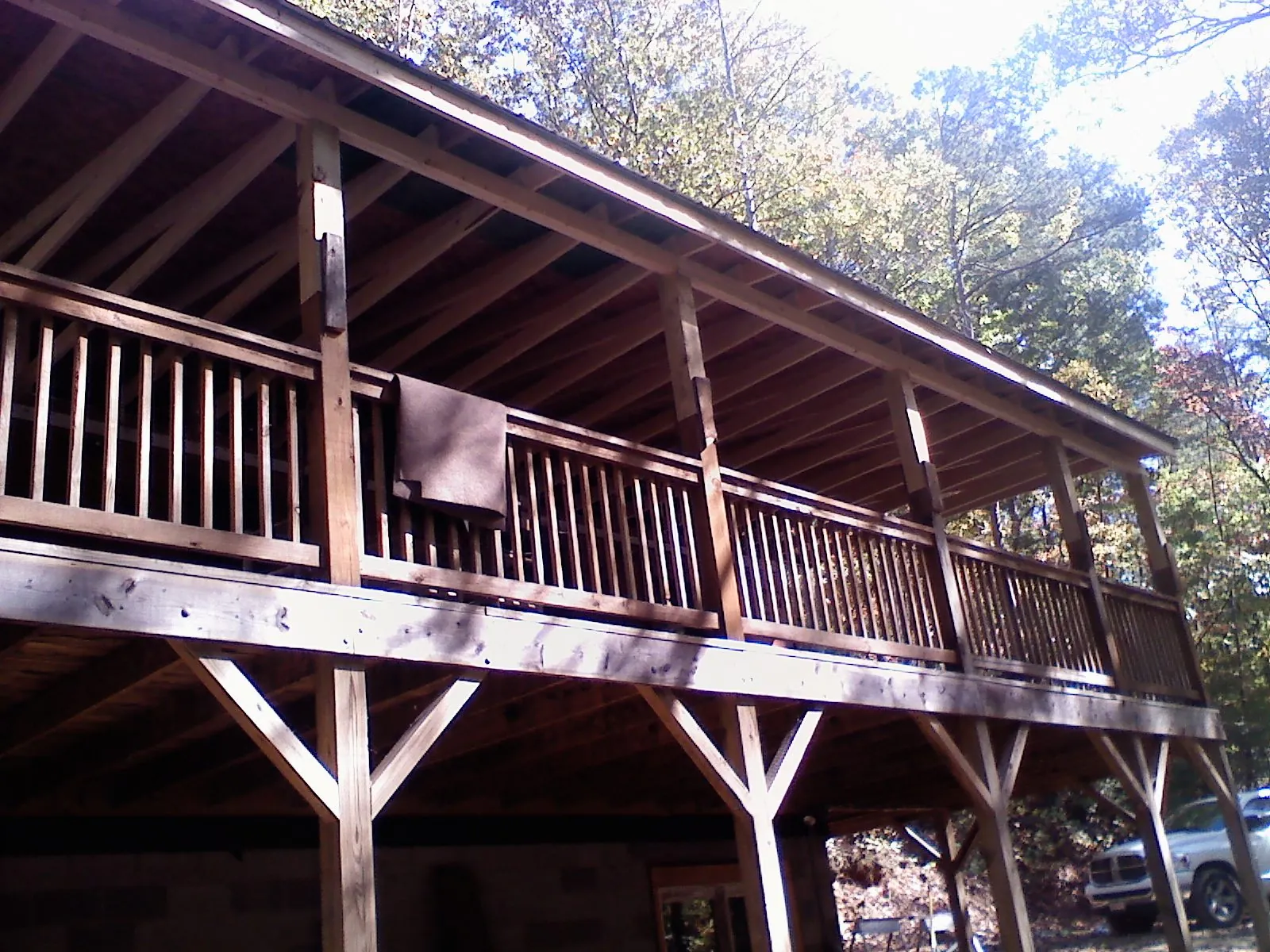 Timber framing under a new elevated porch and deck — Roof Leak Repair in Rogersville by Roofing Brothers
